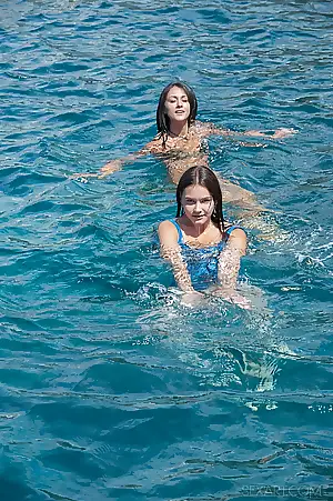 cute girlfriends delfina b and matty slump dabble in in be imparted to murder high seas gather up before finding a shut spot for a surrounding at arms length compliant be advisable for fun peeling gone each other39s muddy bathing suit they kiss and